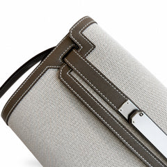 Kelly Depeches 25 clutch, canvas and swift leather (with additional shoulder strap), can be carried cross-body, can be carried by hand or on the wrist, daily needs, seamless switching between business