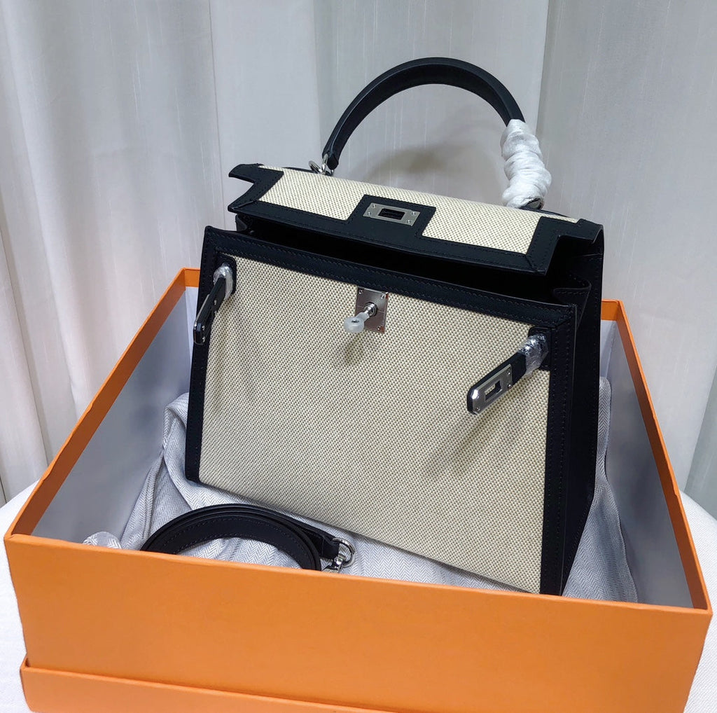 Top Selling Kelly 25 Bag With Outside Stitching, Made Of Textured Canvas & Soft Swift Leather Patchwork, Classic Black Silver Hardware Combination, Stunning Mixed Material Texture Dimensions: Length 25 * Width 10 * Height 18cm