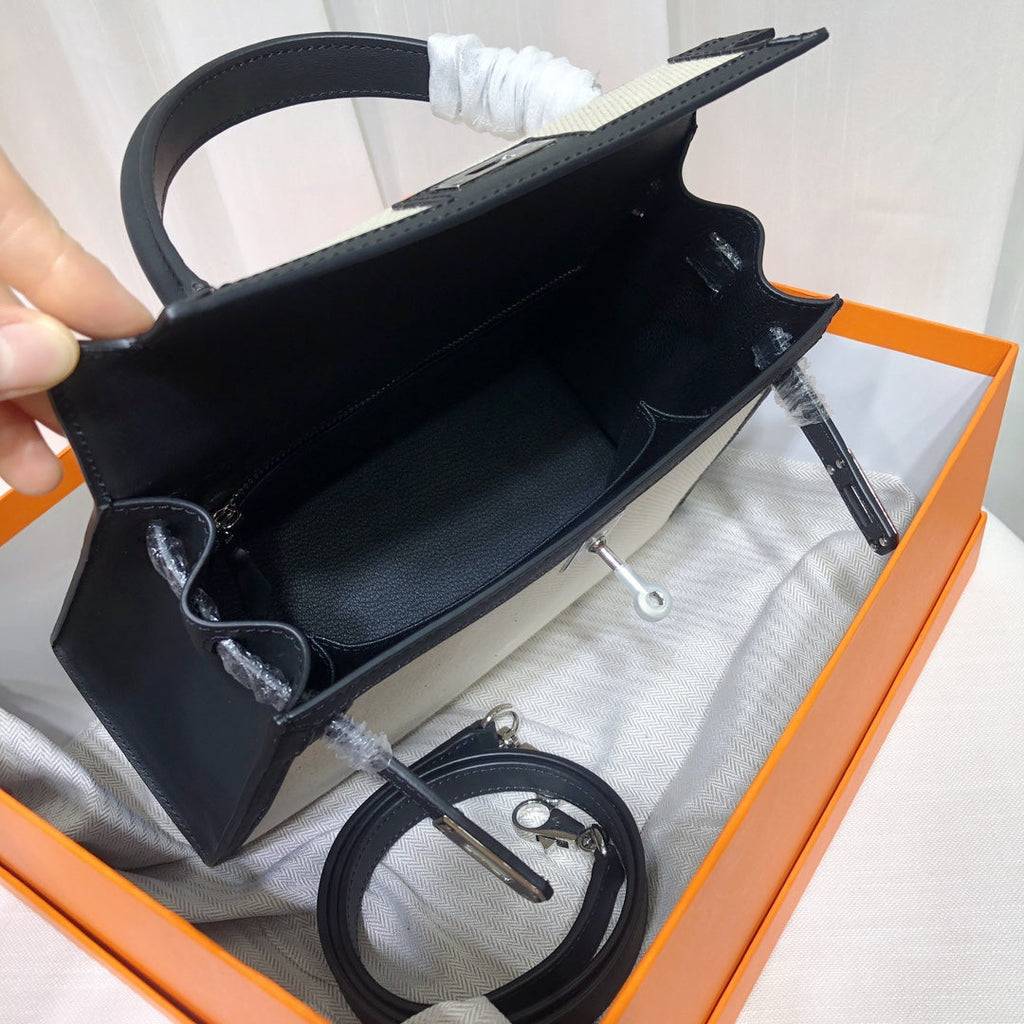 Top Selling Kelly 25 Bag With Outside Stitching, Made Of Textured Canvas & Soft Swift Leather Patchwork, Classic Black Silver Hardware Combination, Stunning Mixed Material Texture Dimensions: Length 25 * Width 10 * Height 18cm