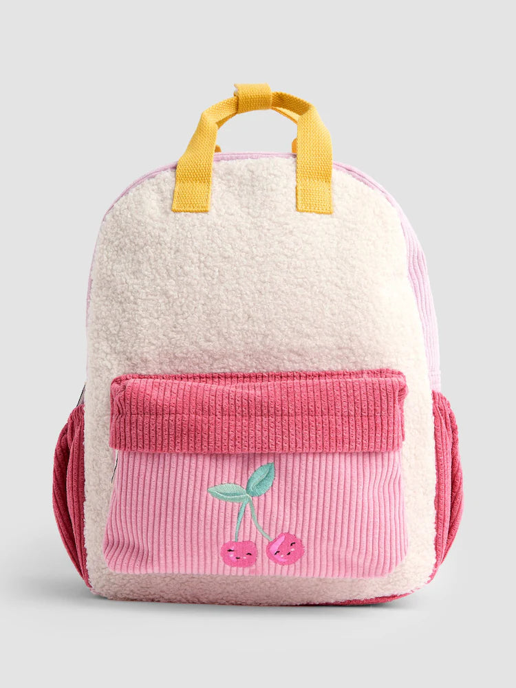 Medium-sized children's teddy fleece backpack in a cherry blossom pink and cherry red color-block design