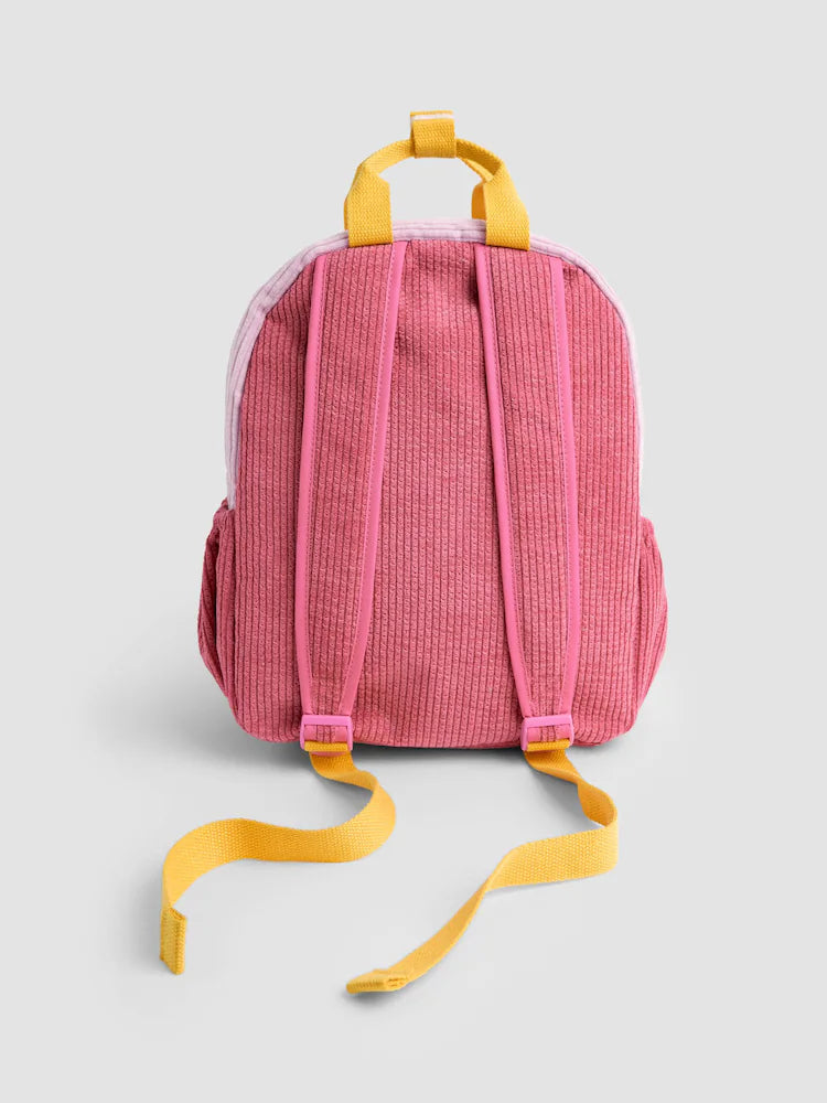 Medium-sized children's teddy fleece backpack in a cherry blossom pink and cherry red color-block design