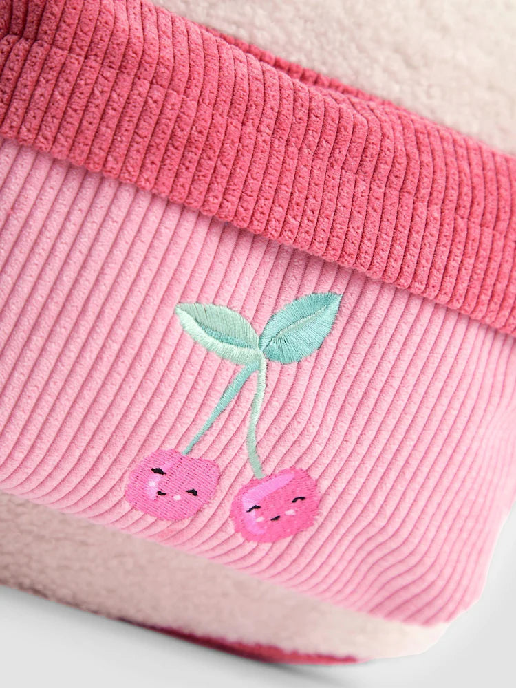 Medium-sized children's teddy fleece backpack in a cherry blossom pink and cherry red color-block design